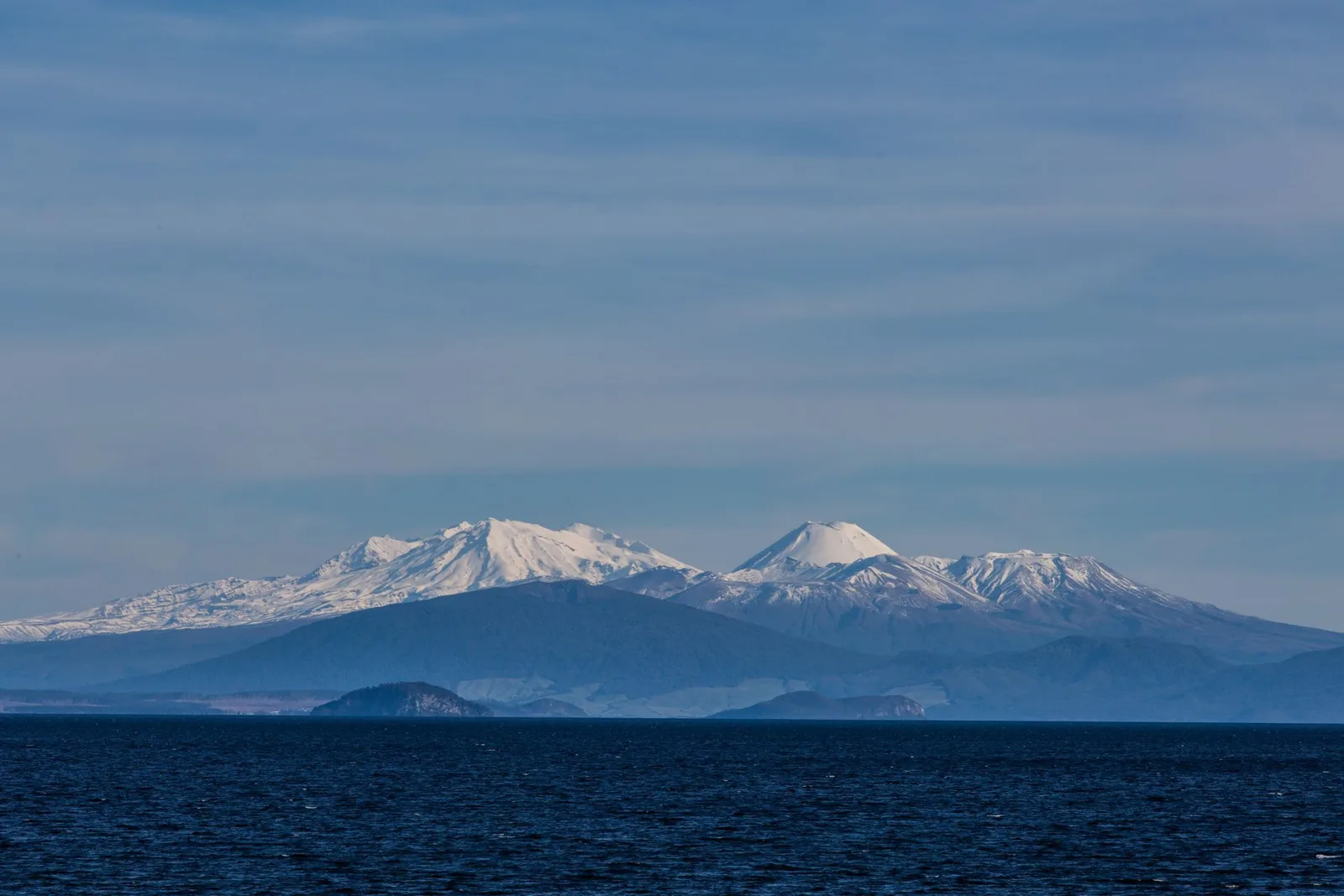 Lake Taupō with snow-covered mountains beyond